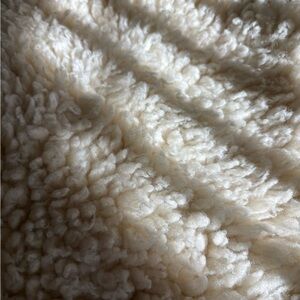 SnugFleece Woolens crib mattress topper